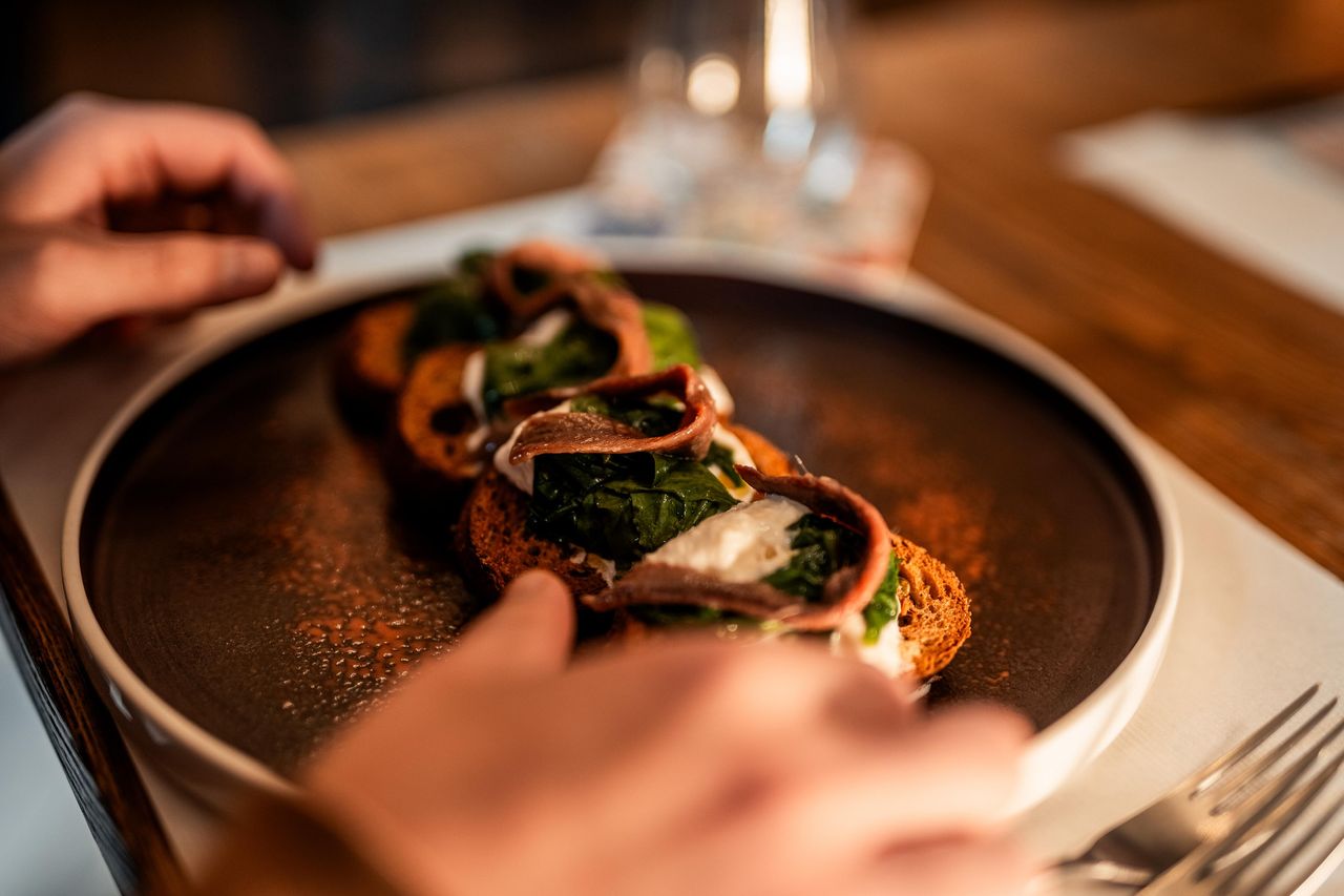 Plating a starter at Osteria Cernicchi