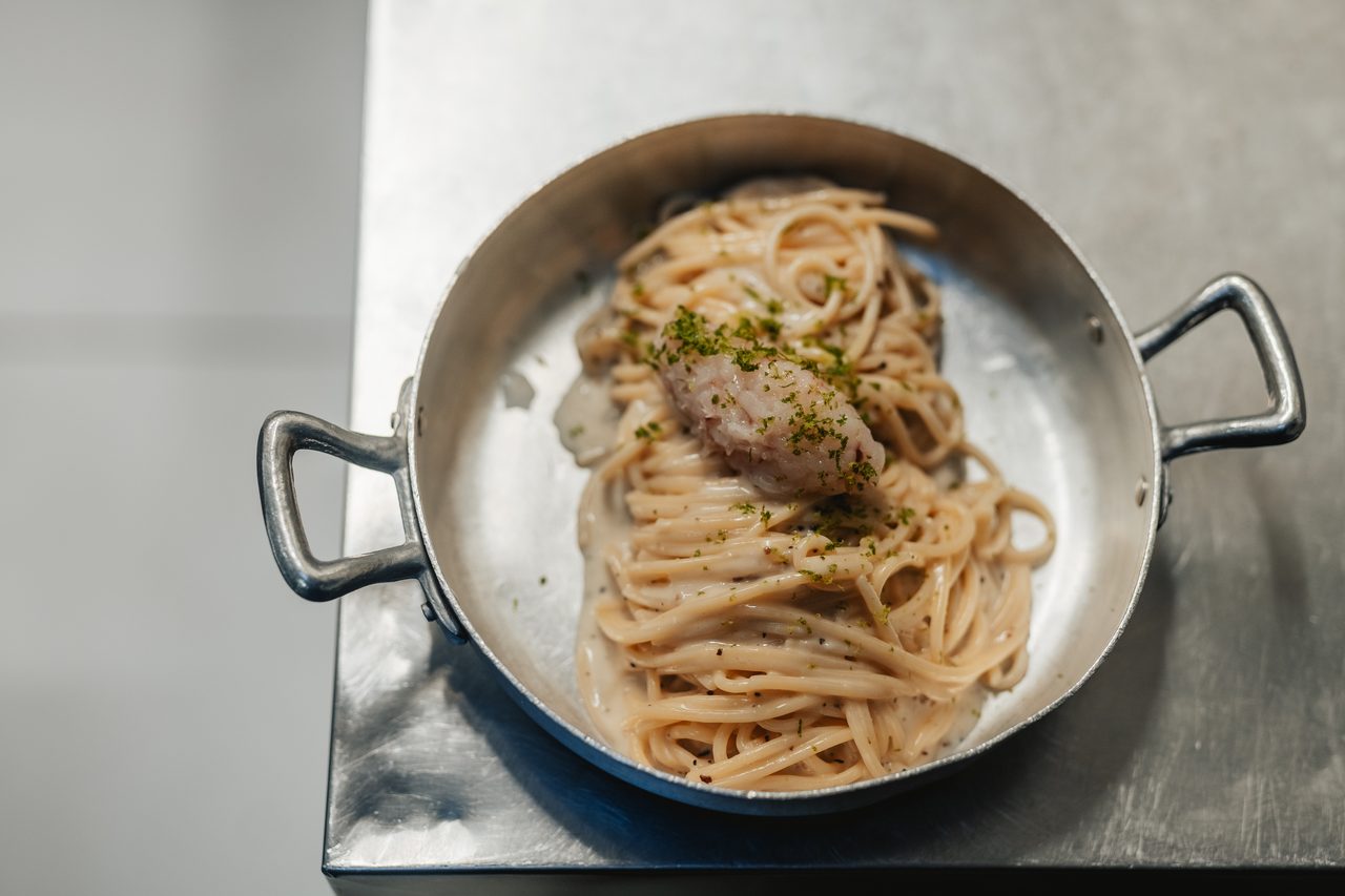 Stuffed pasta finished in the pan with a touch of fish